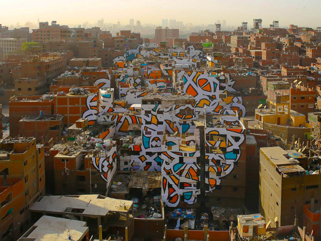 Artist Transforms Neighbourhood Slum With Mammoth Perception Mural